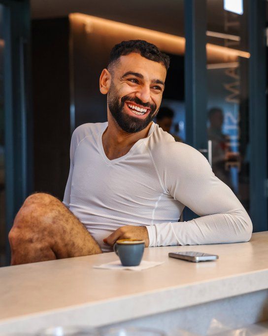 Salah pictured smiling at the AXA Training Centre.