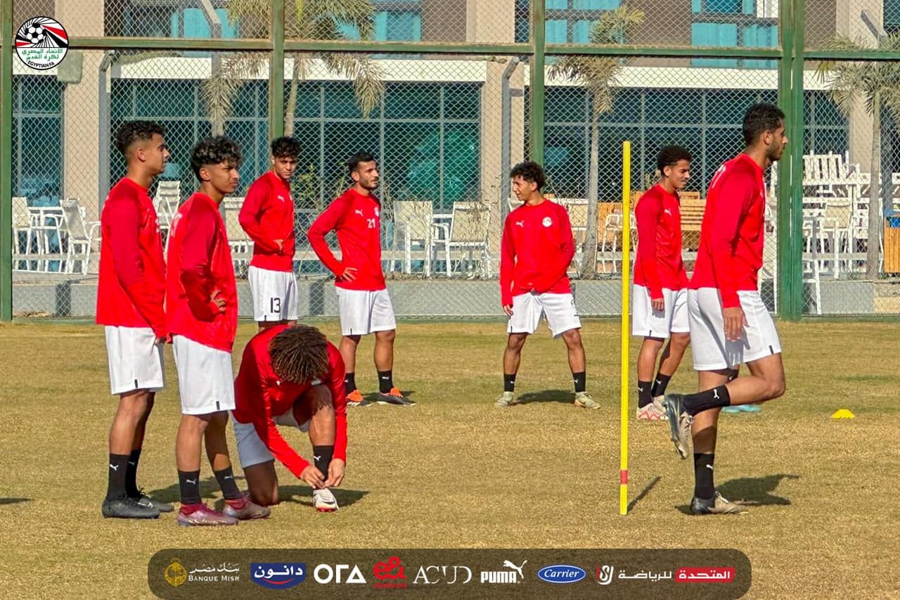 May be an image of 8 people, people playing football, people playing soccer and text